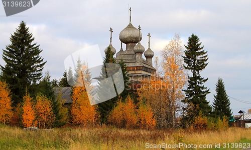 Image of Ancient Russian Church in the autumn forest