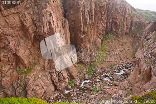 Image of river  valley deeply among rocks Scandinavia