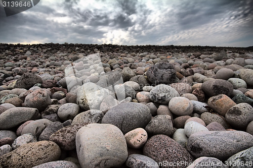 Image of boulders beach on shore of Barents sea