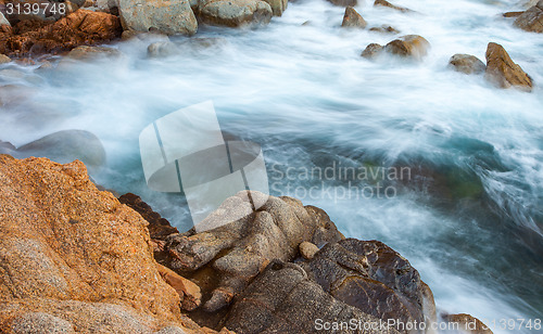 Image of surf and coastal rocks