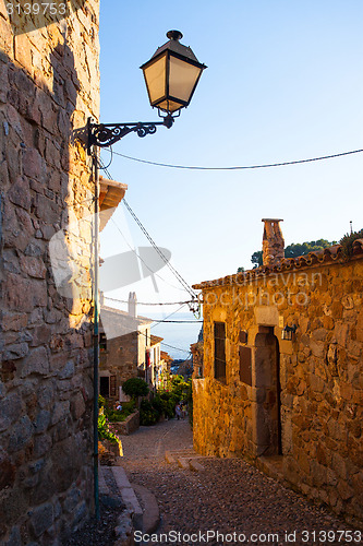 Image of Tossa de Mar, Catalonia, Spain, texture of the ancient streets o