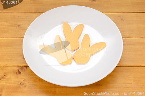 Image of Three rabbit-shaped biscuits for Easter 