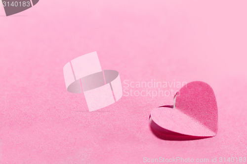 Image of Pink paper hearts and pink background