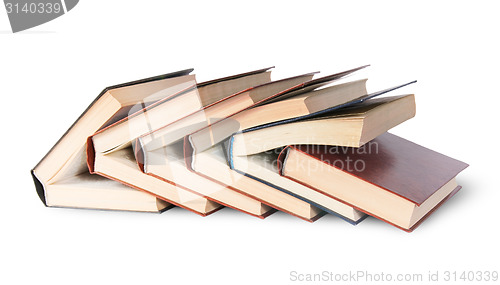 Image of Six old books imbedded in one another front view