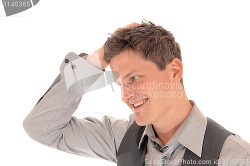 Image of Man scratching his head.