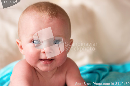 Image of Close Up Portrait Young Blue Eyed Infant Boy Male Child
