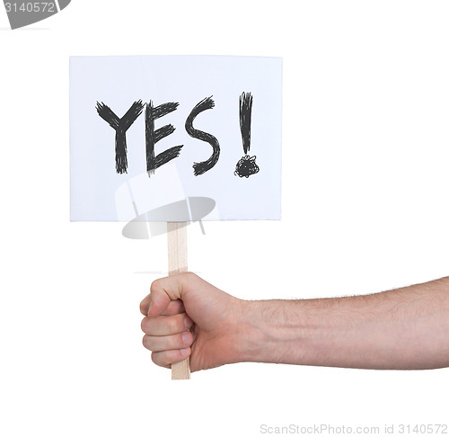 Image of Hand holding sign, isolated on white