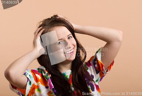 Image of Fashion portrait of smiling beautiful young girl 