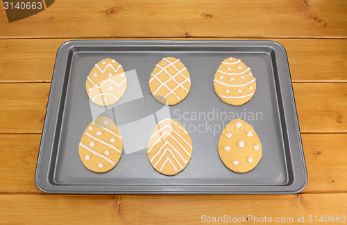 Image of Frosted Easter egg cookies on a baking tray