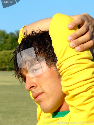 Image of Young man in yellow