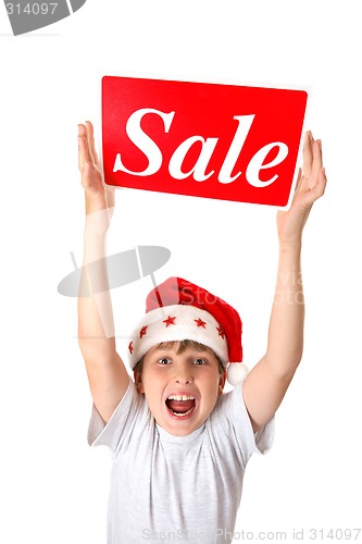 Image of Excited boy with Sale Sign