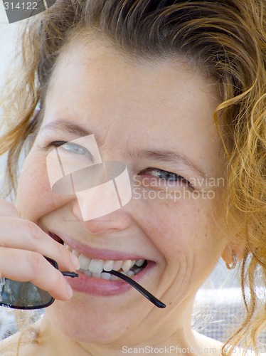 Image of blond woman playing
