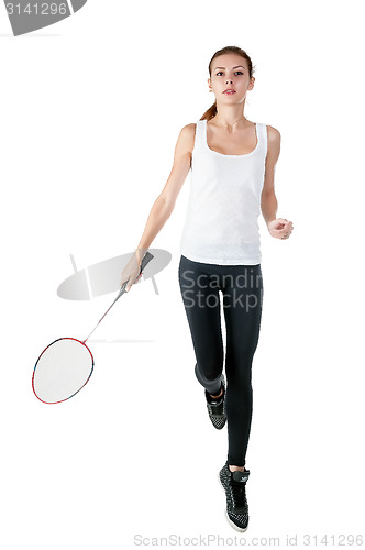 Image of Beautiful girl with badminton racket in hands