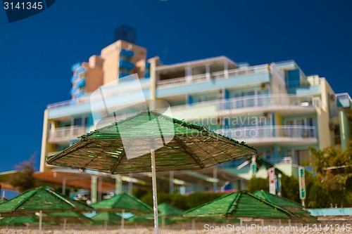 Image of beach with parasol