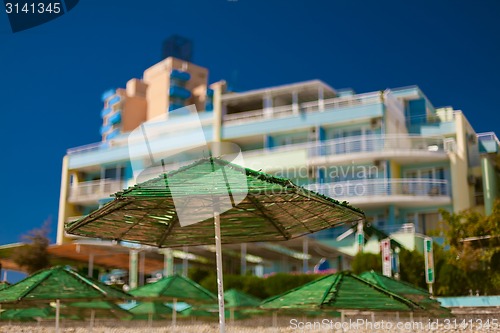 Image of beach with parasol