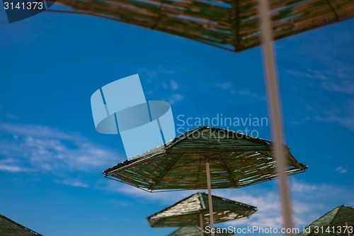 Image of beach with parasol