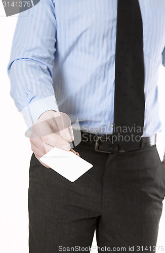 Image of Man holding business card