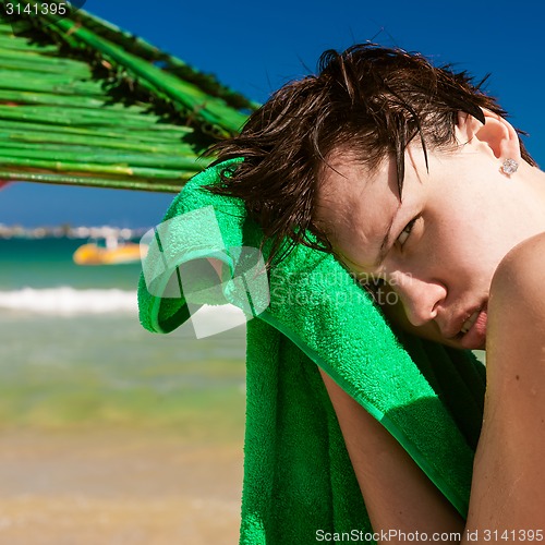 Image of Sexy young woman on the beach