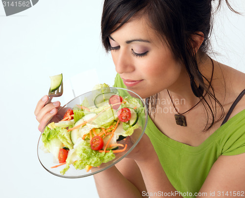 Image of Healthy Eating Woman Enjoys Raw Food Fresh Green Salad