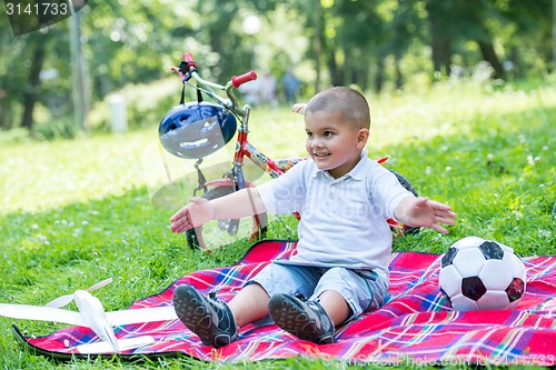Image of boy with airpane toy