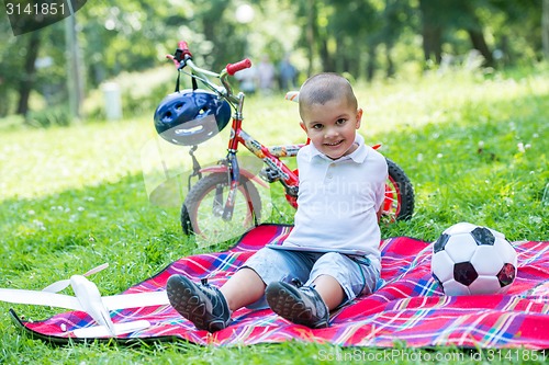 Image of boy with airpane toy