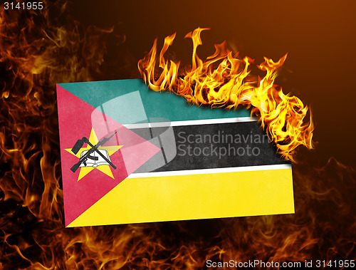 Image of Flag burning - Mozambique