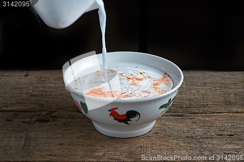 Image of Coconut milk pouring 