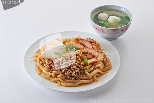 Image of Fried noodle with roast pork sliced fish cake minced pork and fi