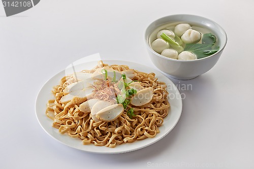 Image of Fried noodle with fish cake and fishball soup