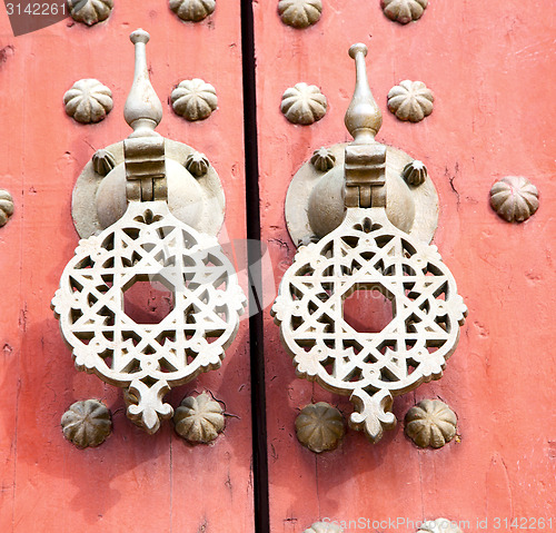 Image of metal rusty  brown    morocco in africa the old wood  facade hom