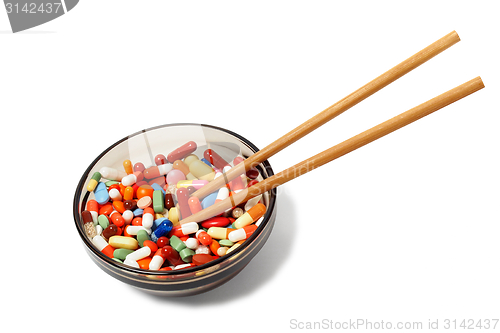 Image of Bowl with drugs and chopsticks