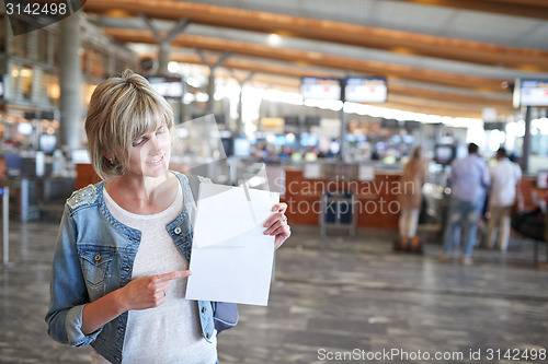 Image of Woman with backpack going on boarding