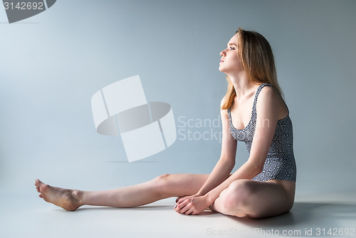 Image of Attractive girl in bathing suit