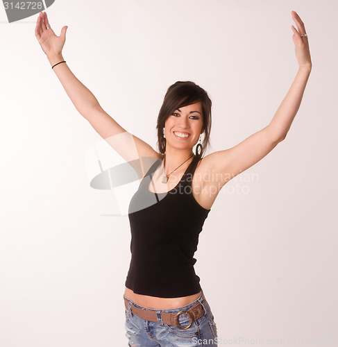 Image of Woman Celebrates Winning Attitude Arms Outstretched Reaching Upw