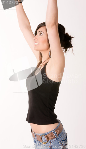 Image of Woman Celebrates Winning Attitude Arms Outstretched Reaching Upw