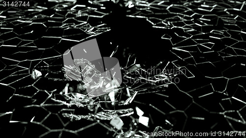 Image of Broken and splitted glass pieces on black