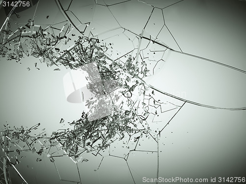 Image of Breaking or demolishing glass on grey