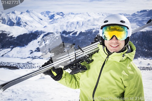 Image of Young successful men ski mountain winter resort