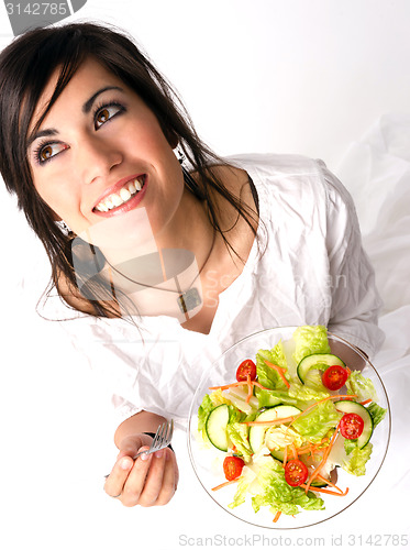Image of Healthy Eating Woman Enjoys Raw Food Fresh Green Salad