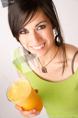 Image of Attractive Woman Intimate Portrait Drinking Orange Fruit Smoothi