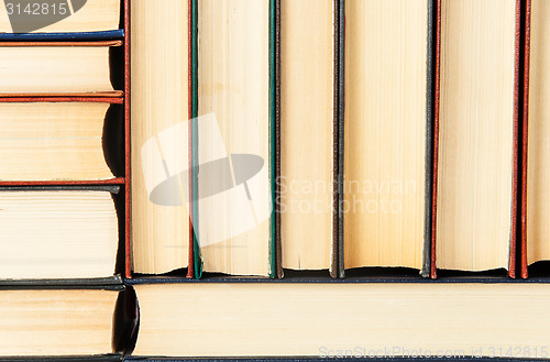 Image of Abstract background of stacked on each other old books