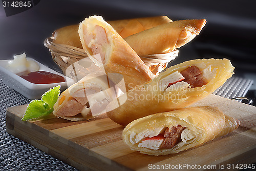 Image of Fried crab sticks and sausages 