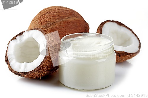 Image of jar of coconut oil and fresh coconuts