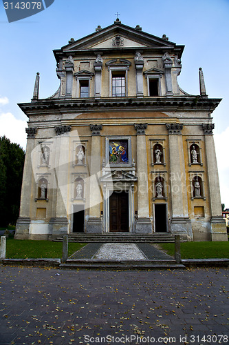 Image of  church  in  the somma lombardo old   closed brick tower sidewal