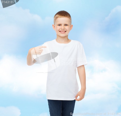 Image of smiling little boy in white blank t-shirt