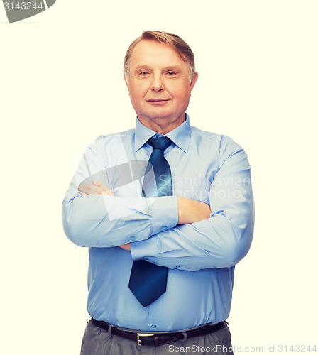 Image of smiling businessman or teacher