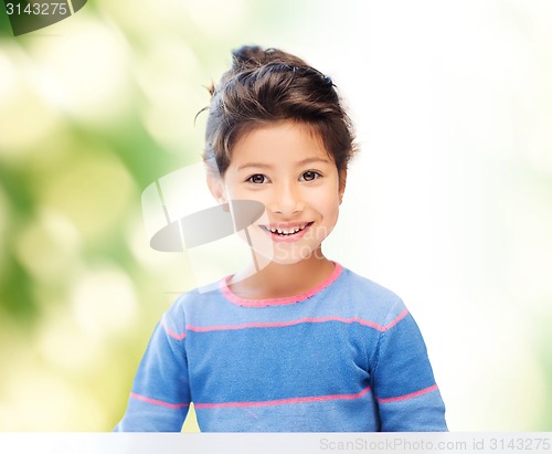 Image of little girl over green background