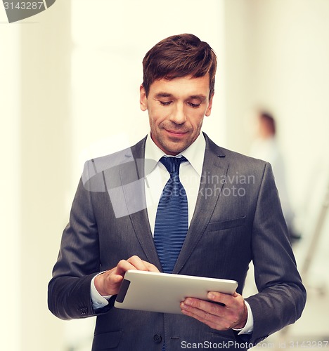 Image of buisnessman with tablet pc
