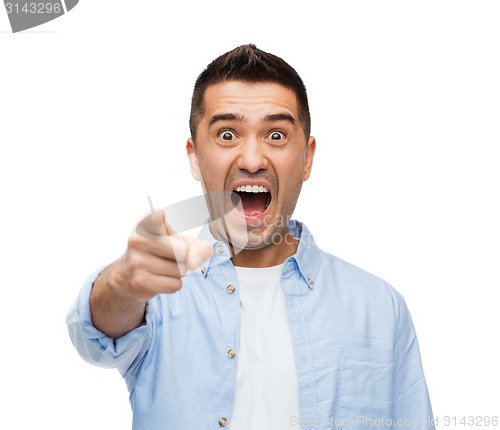 Image of scared man shouting and pointing finger on you