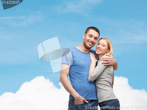 Image of smiling couple hugging